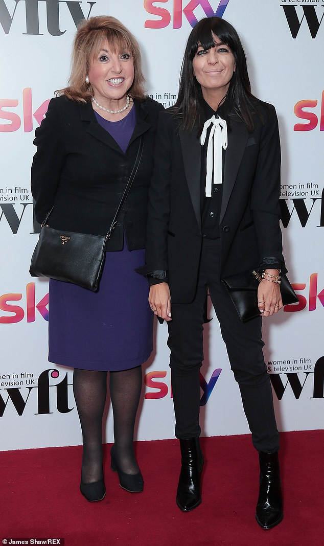 During an appearance on Vanessa Feltz 's Channel 5 the author, 81, revealed the Strictly host uses her fake tan and lashings of mascara as a 'uniform' (pictured together 2019)