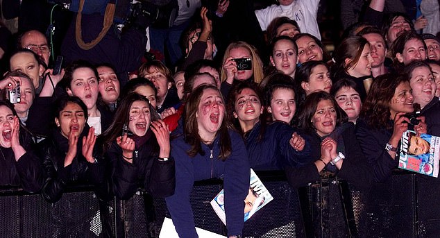 William was dubbed the 'British Leonardo DiCaprio'. Pictured is a crowd of banner-wielding DiCaprio fans outside the Empire Leicester Square for the European premiere of The Beach in 2000