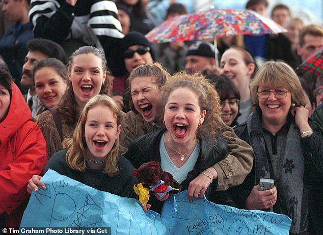 The Mail's Richard Kay wrote at the time how there were 'crowds of teenage girls weeping, screaming and jostling to just catch a glimpse of their idol'