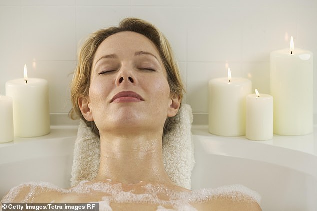 Professor Wisden says: 'I recommend just before bedtime, take a hot shower or warm bath, even on a warm evening' (stock image)
