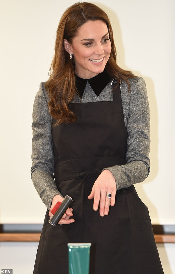 Like many other students, Kate - pictured in London in 2019 - once took on a waitressing job, admitting in 2019 she was 'terrible'