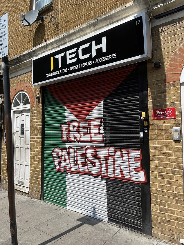 Palestinian flags flutter from windows or are painted onto the grills of shopfronts