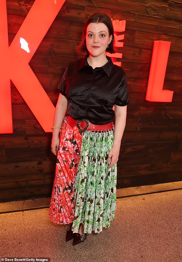 The Chronicles of Narnia star Georgie Henley cut an elegant figure in a black top with a vibrant floral skirt