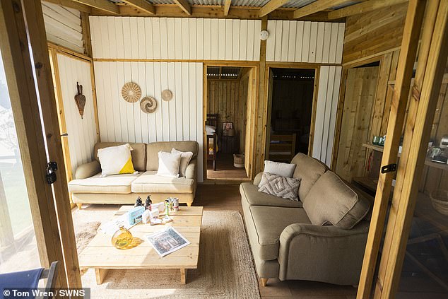 It is fully equipped with fresh bedding and linen, toiletries, fluffy towels, hanging rails for guests' festival-ready outfits, carpeted floors, and deck chairs to unwind in