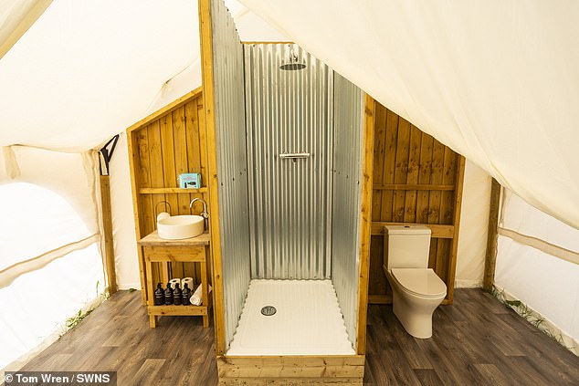 The Pop Up Hotel glamping site provides guests with access to functioning loos and showers which means they don't need to line up for the portaloo