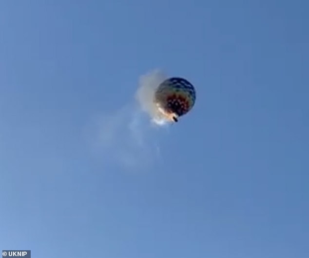 The horrifying crash (pictured) happened today in the country's southern state of Santa Catarina, in its Praia Grande region - a well-known hot air ballooning location