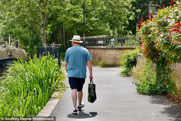 BERKSHIRE: A man strolling around the town amid the sunshine today