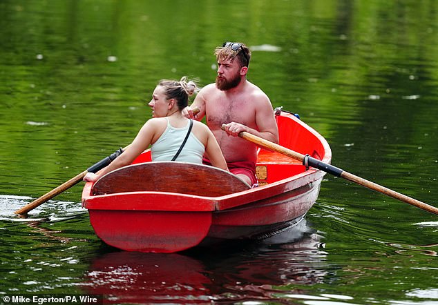 NOTTINGHAM: People on the boating lake at Highfields Park on June 20