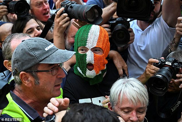 Kneecap member DJ Próvaí (JJ O'Dochartaigh) arrives at Westminster Magistrates' Court