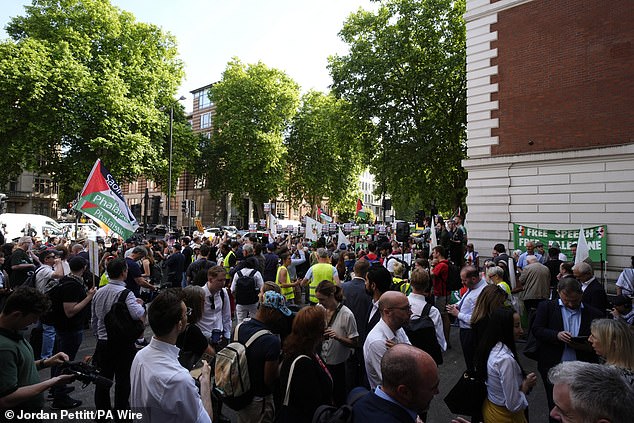 Supporters of Kneecap's Liam Og O Hannaidh outside Westminster Magistrates' Court