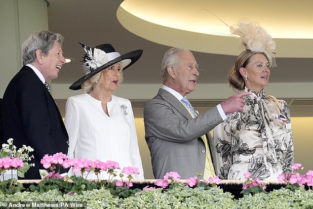 King Charles III andn Queen Camilla watched on in shock as Lazzat floored jockey James Doyle
