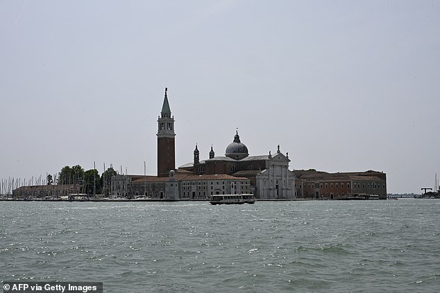 The island of San Giorgio, (pictured) which is owned by the Cini Foundation, will not be open to the public