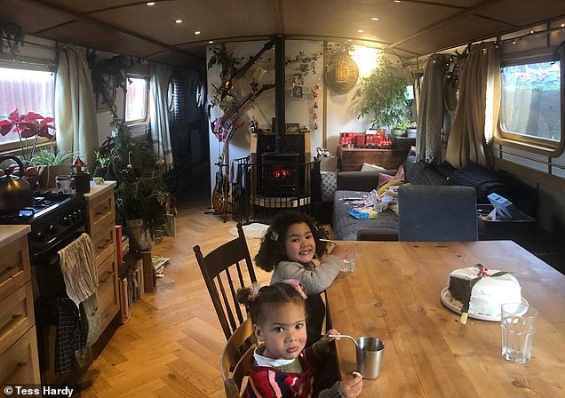 Before: The family had lovingly restored the boat from a shell into a 'beautiful' home
