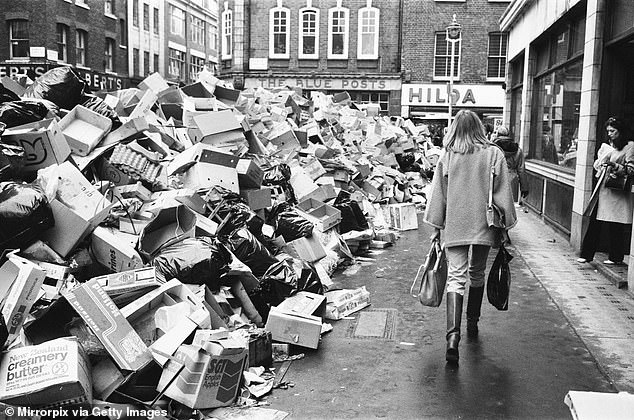Experts fear the measures could lead to another 'winter of discontent' as Britain experienced in the 1970s. Pictured: Rubbish piles up on the streets of London's Soho district in January 1979 due to industry action by refuse collectors
