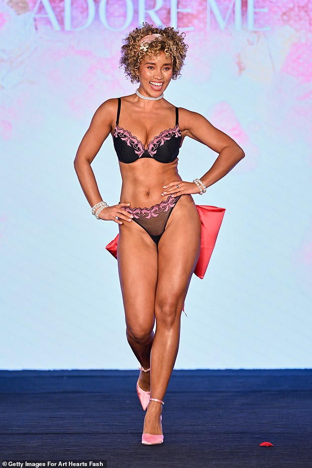 Elle Smith struts down the catwalk during the Adore Me fashion show at New York Fashion Week last year
