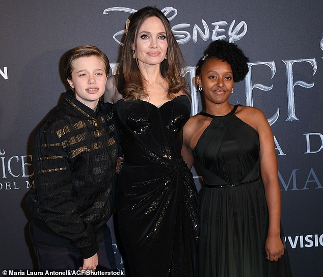 Pitt and Jojlie's contentious divorce battle was finalized eight years later in late 2024 and since then, many of their kids have dropped Pitt's surname amid their ongoing estrangement. Shiloh also now goes by Shiloh Nouvel Jolie; pictured October 2019 in Rome