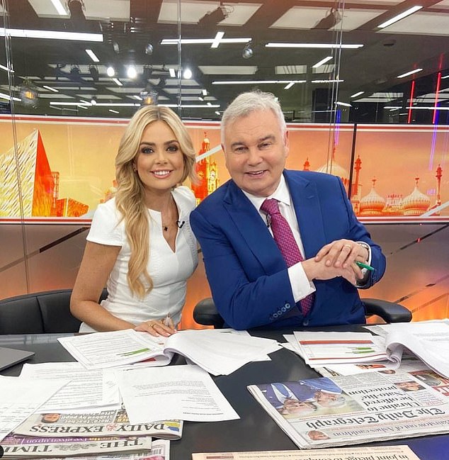 Mr Holmes (pictured with GB News colleague Ellie Costello) has been battling health issues since surgery in 2022, and it is said that he now has very little feeling in his lower back