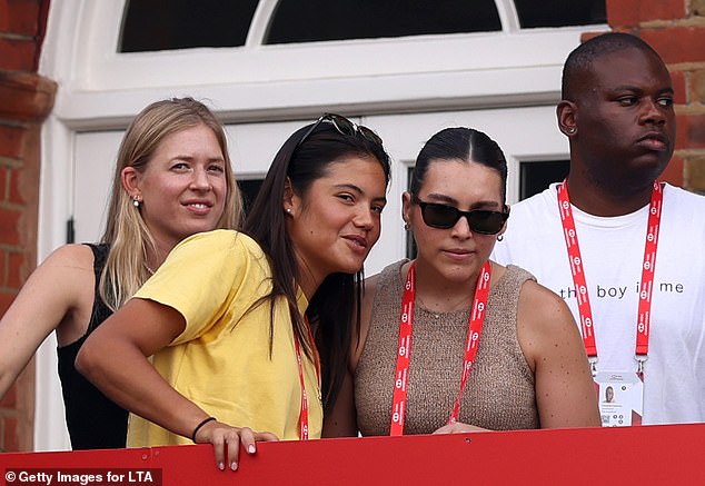 Emma Raducanu looked slightly uncomfortable after she was caught on camera watching Alcaraz