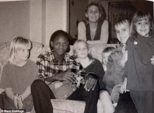 Pictured: Stevie as a kid with the Masai tribesman, Daniel Lekimencho
