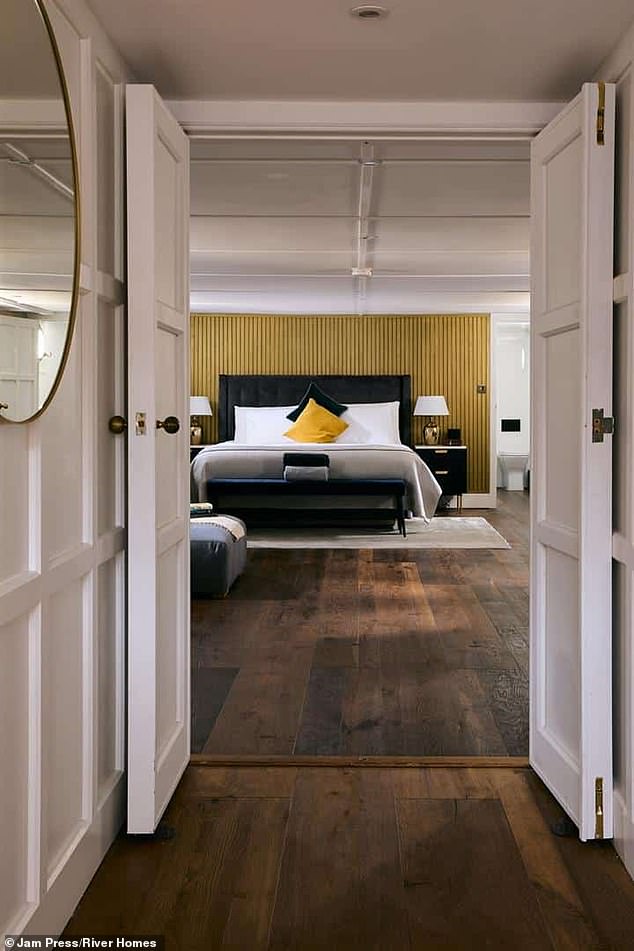 The barge sitting on the Thames and up for £1.5million includes four en-suite double bedrooms