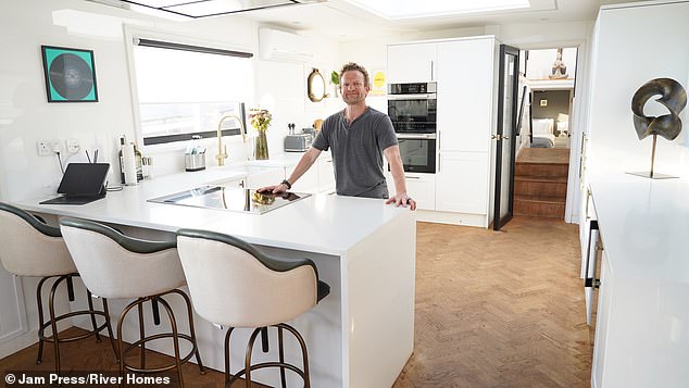 David Karat, from the US, and his partner moved into the barge in August 2021, after its initial conversion by previous owners