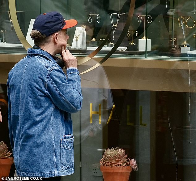 On Saturday, Martin was seen perusing the pieces on offer at a Dinny Hall store in north London