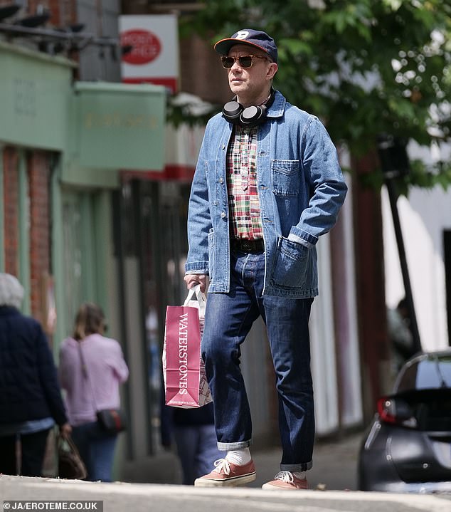 The star attempted to keep a low profile in a baseball cap and sunglasses as he strolled through the capital