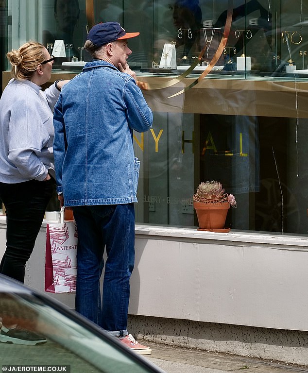 'He even fetched the shop assistant so he could point out which one wanted to look at. He was wearing a cap so he could go incognito,' the source added