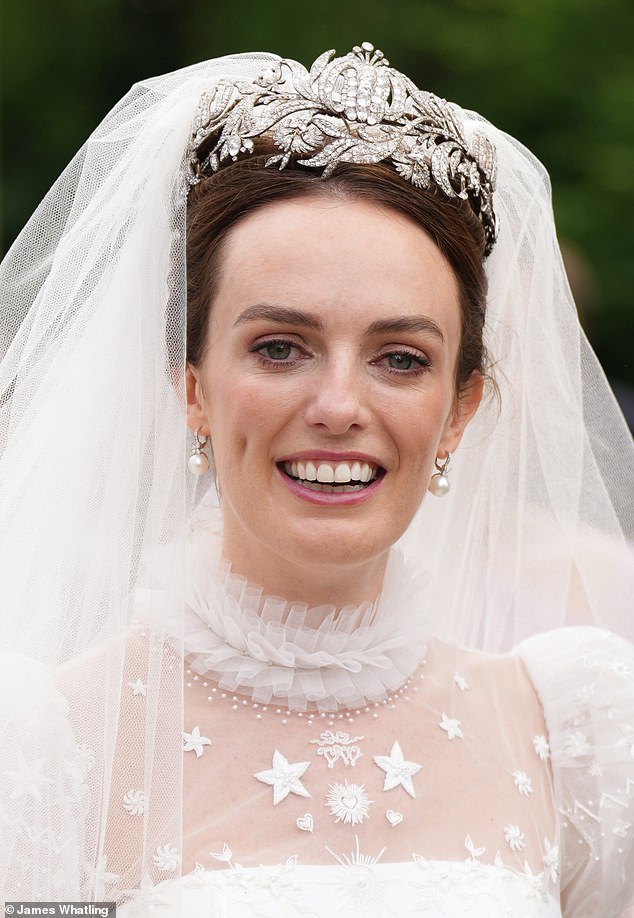 Beautiful bride: Lady Violet looked resplendent in a Phillipa Lepley couture gown on her big day