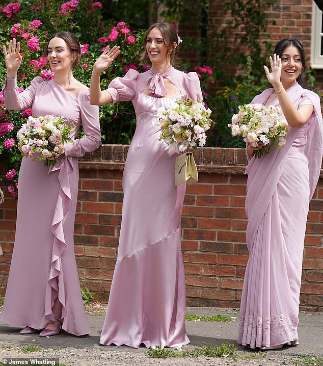 The bridesmaids carried pale pink rose bouquets that co-ordinated with their violet-hued gowns. From left, Lady Eliza Manners, Lady Alice Manners and Devisha Kumari Singh
