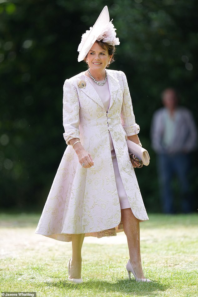 Emma Manners, Duchess of Rutland, who is being treated for breast cancer, looked elegant as mother-of-the-bride in a pale pink jacquard coat and matching dress with a striking light pink tilted hat