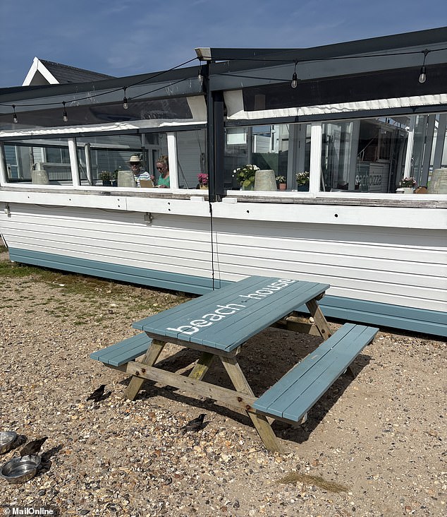 The Beach House building burnt down in November 2018 and has currently been replaced by a temporary cafe, operating from three shipping containers while the council make plans for a replacement