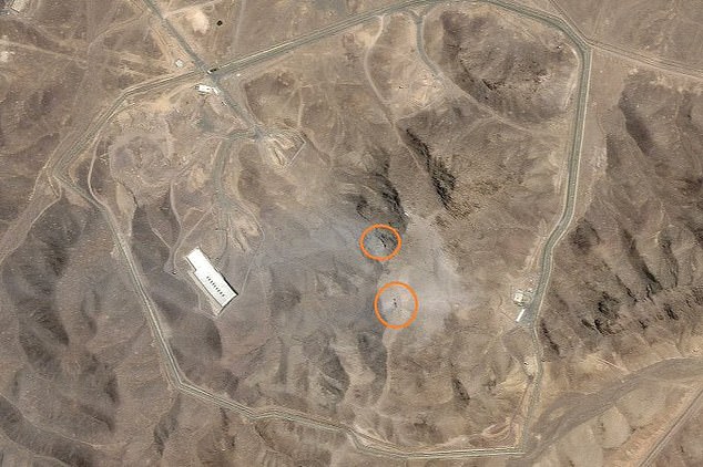 The orange circles appear to show damage to the entryways to Iran's underground nuclear site