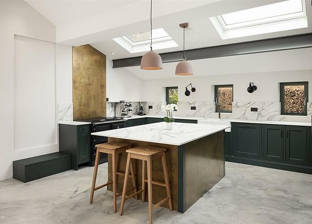 The property, which boasts modern decoration (above) was listed on the market for offers over £895,000