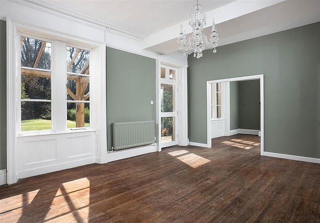 The home on the market comes with a large double garage and has an enclosed private garden