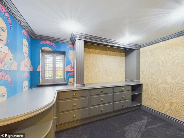 Another room contains its own 'very interesting' wallpaper with the late Queen showcased on the wall in an iconic pop art format