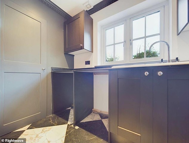 The property is advertised as an 'impressive house in the sought after village of Waddesdon'