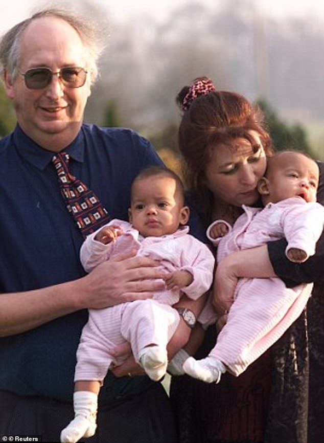 Alan and Judith Kilshaw are pictured with the twin babies