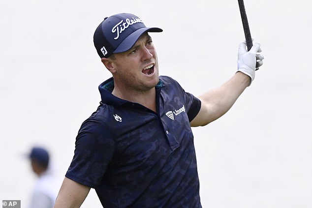 The American's drive on the par-five 13th hurtled out of bounds on the left