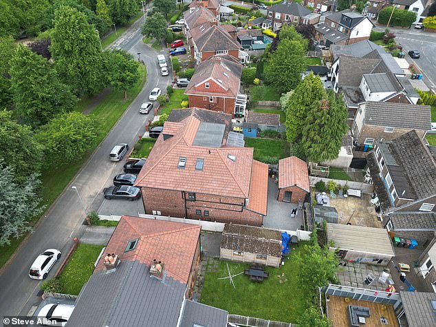 An aerial image shows the difference between the house and others on the road