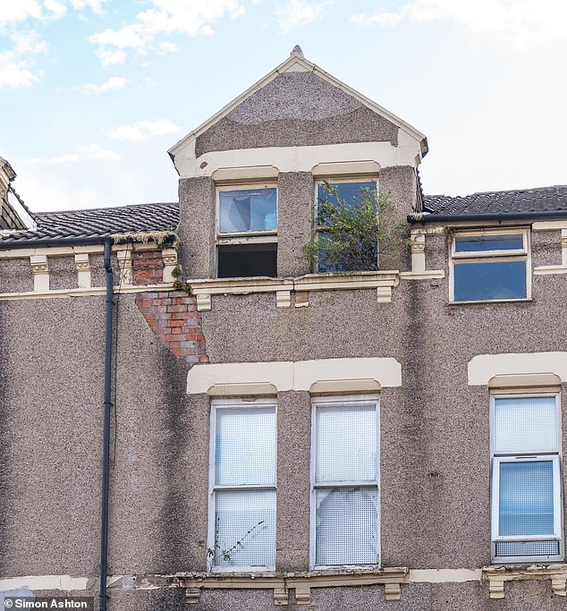 Number 15 Harlington Road has been left abandoned with smashed windows