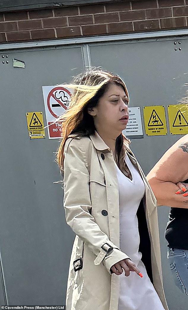 Susilla Mercer, 44, arriving at court to be sentenced for the harassment of her estranged husband and the racially aggravated harassment of his new girlfriend