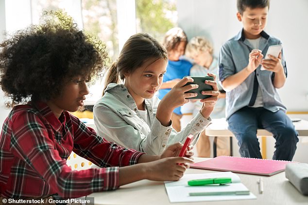 For many students, their phone was the first thing they check when they wake up and the last thing they look at before bed (stock image)