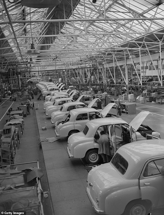 A line of almost completed Standard Eight cars at the Standard factory in Coventry, 1953