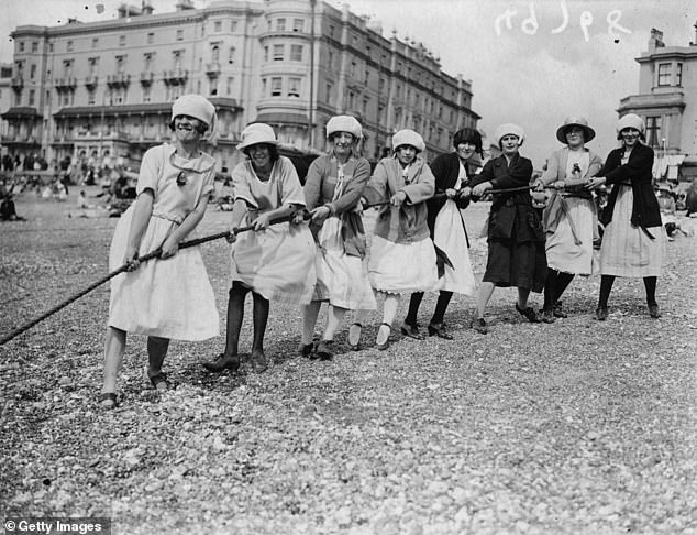Some workers from the Ticklers Jam factory in Grimsby, are photographed on a day out on Hastings beach in 1923. Ticklers Jam had one of the largest factories in Grimsby during the 1920s, and supplied the frontlines with jam during WW1