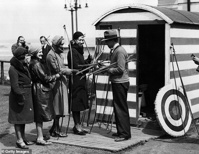 Women seen with bows and arrows during an archery session in Scarborough, 1932