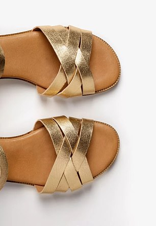 Handcrafted in Italy, these sandals feature luxurious metallic gold leather straps, a leather-covered foam insole and a comfortable block heel