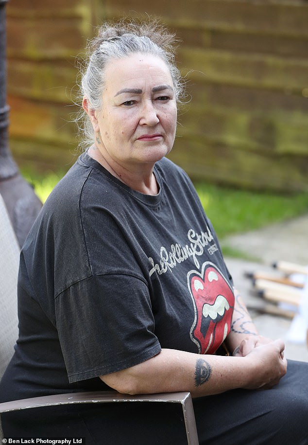 Lena Carter, 64 (pictured), who has lived on the street for nearly 30 years, said her daughters used to play in Rauf's back garden. She said: 'They were never allowed in the house thank God. He broke the law but he knows how to play the system. I can't believe he is still there. But I am not moving'