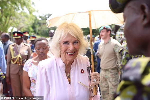 Queen Camilla in Mombasa in November 2023 during their Majesties royal tour wearing her favourite Apollo topaz pendant