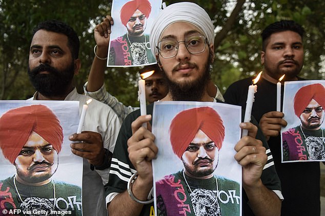 Youths and supporters paid tribute to the late Punjabi singer during a candlelight vigil in Amritsar in May, 2022